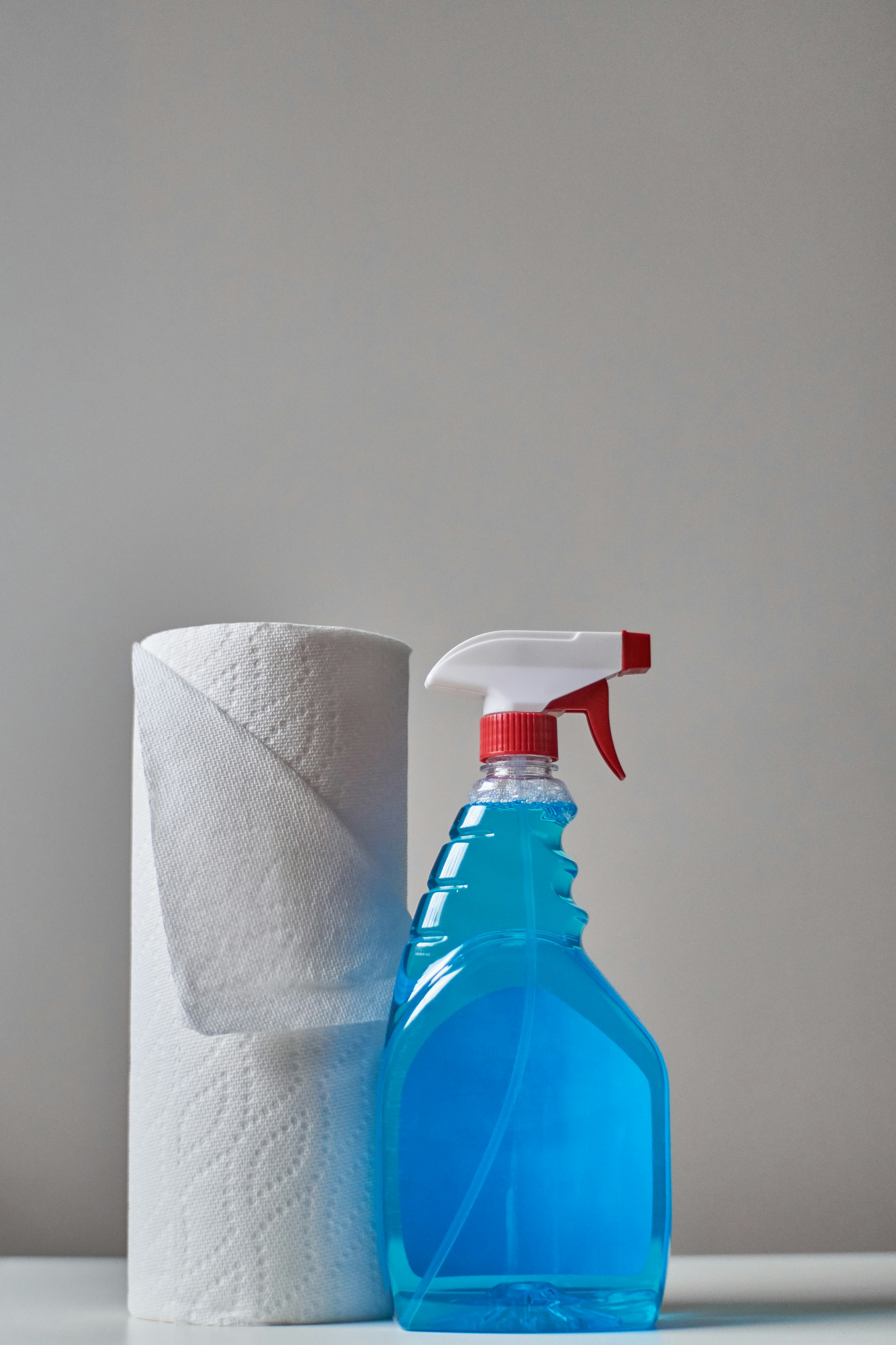 A well-organised shelf of cleaning supplies