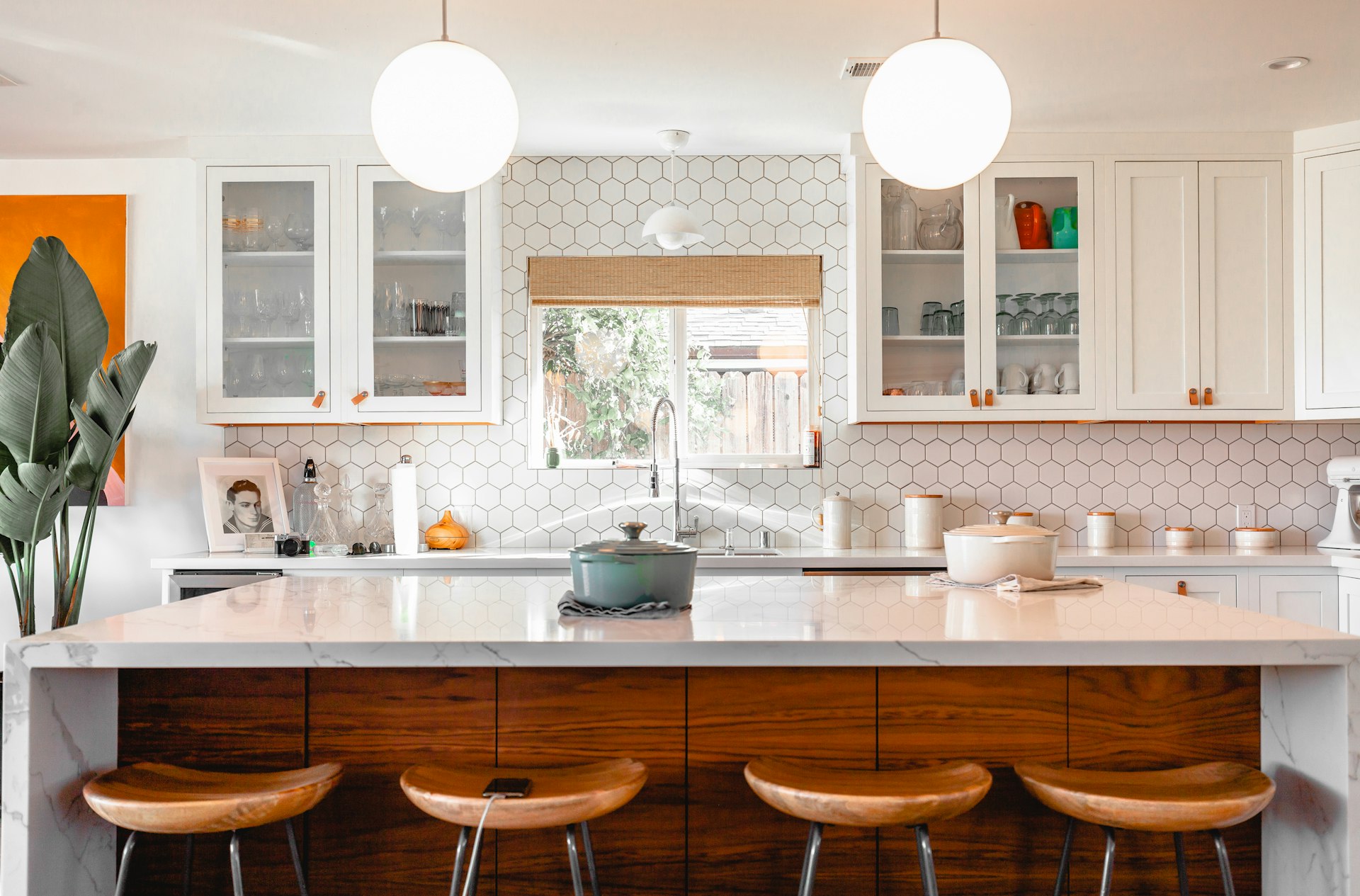 A pristine, sunlit kitchen interior